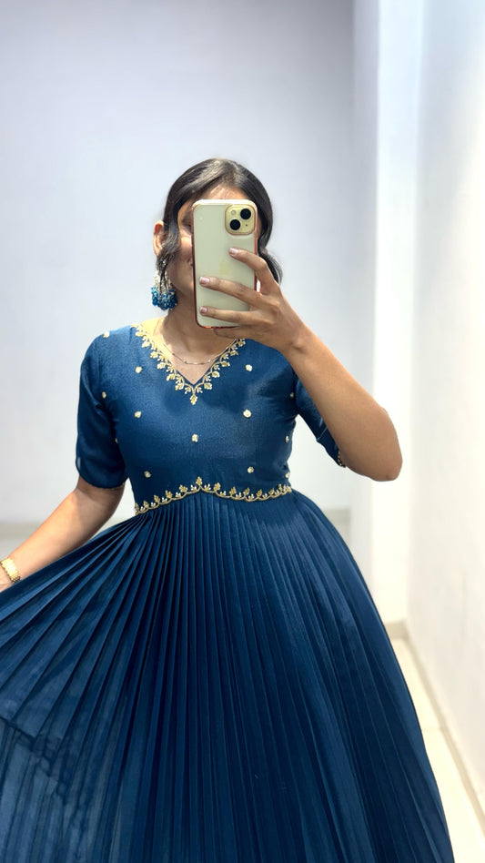 Look at our morpinchh color full length dress with hand embroidered neckline