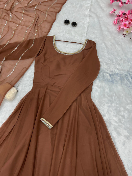 Festive Wear Shine Border Brown Color Gown