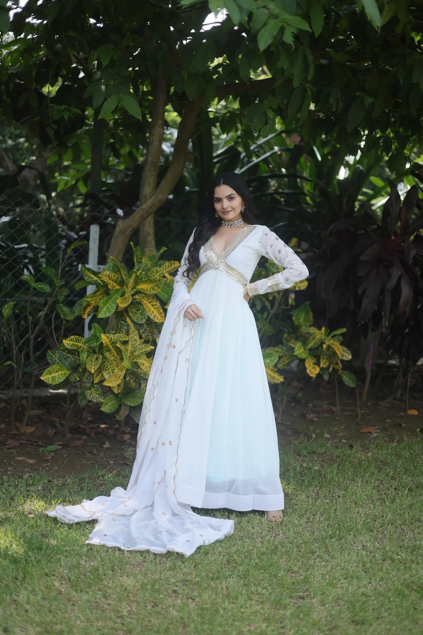 Luxuriant White Color Blooming Embroidery Zari Sequins Work Gown