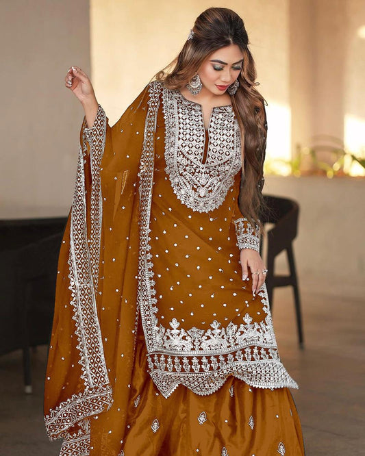Decent Embroidery Sequence Work Orange Color Sharara Suit