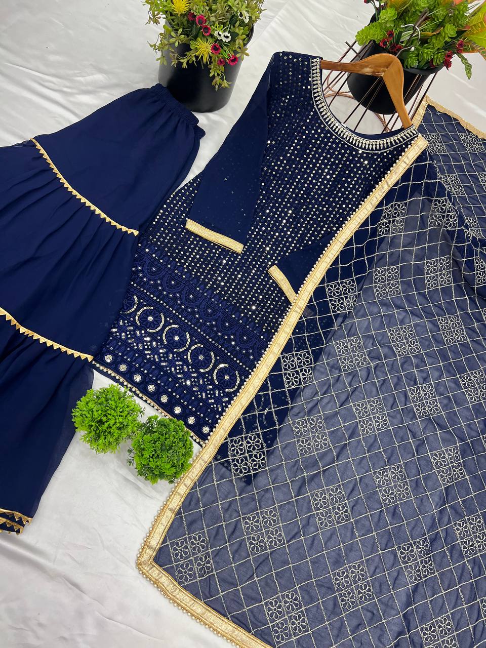 Fashionable Georgette Blue Color Sharara Suit
