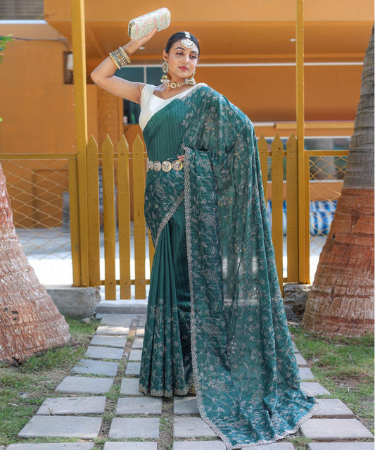 Captivating Silk Floral Design Teal Green Color Saree