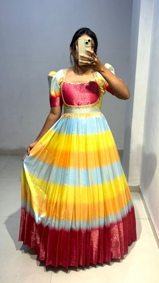 Look at beautiful pastels multicoloured dress crafted with nice detailing of lace on neck with grand border!! And duppta with zari border!