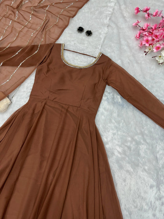 Festive Wear Shine Border Brown Color Gown
